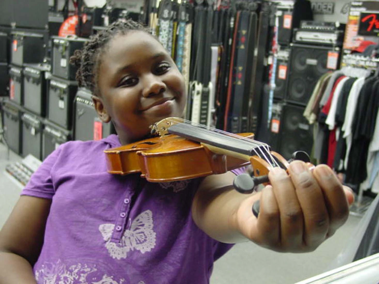 Parent and student choosing a school instrument rental at Music Land in Bel Air Maryland